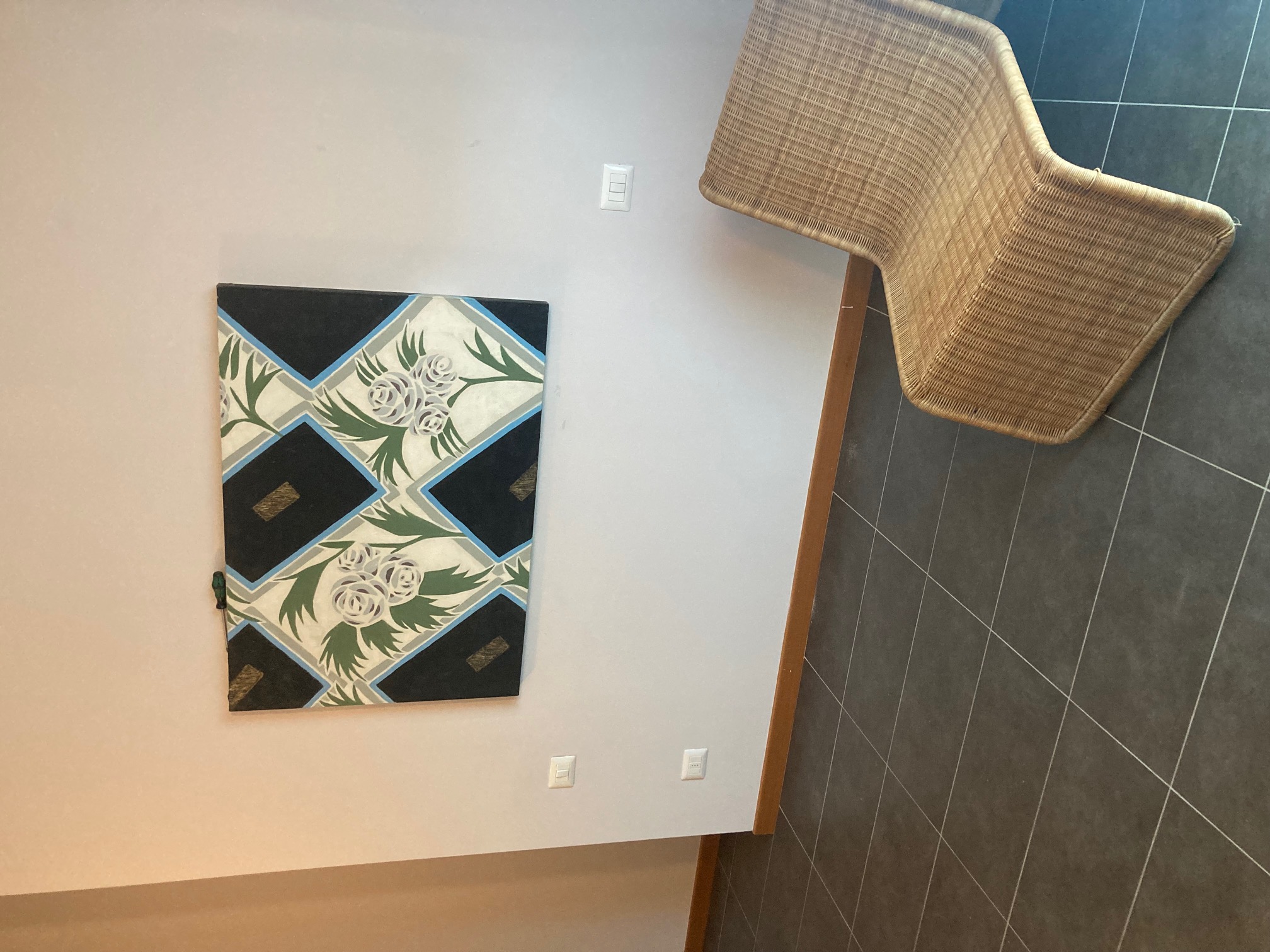 Corner with a chair and framed artwork